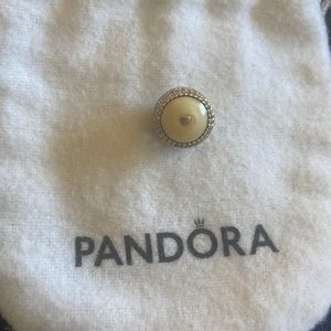 Pandora charm. Authentic. .925 with gold heart in center.